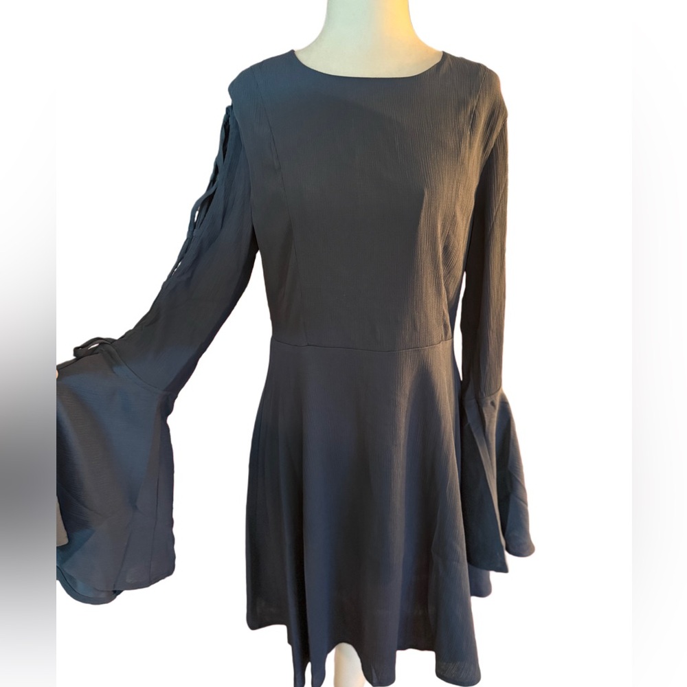 NWT Beautiful blue double lined Dress with flutter sleeves.